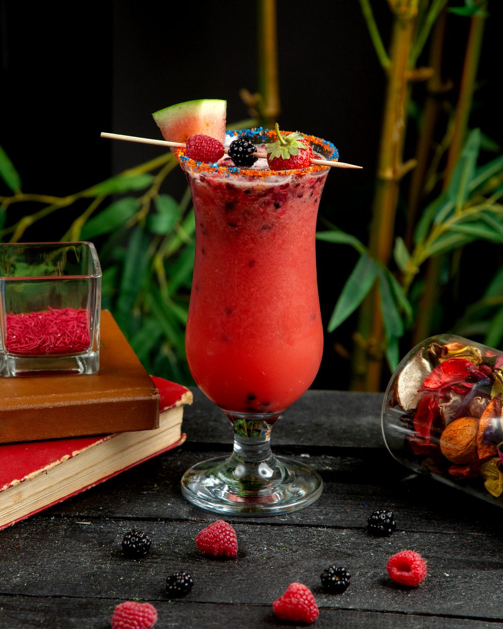 Berry mojito garnished with fresh fruit